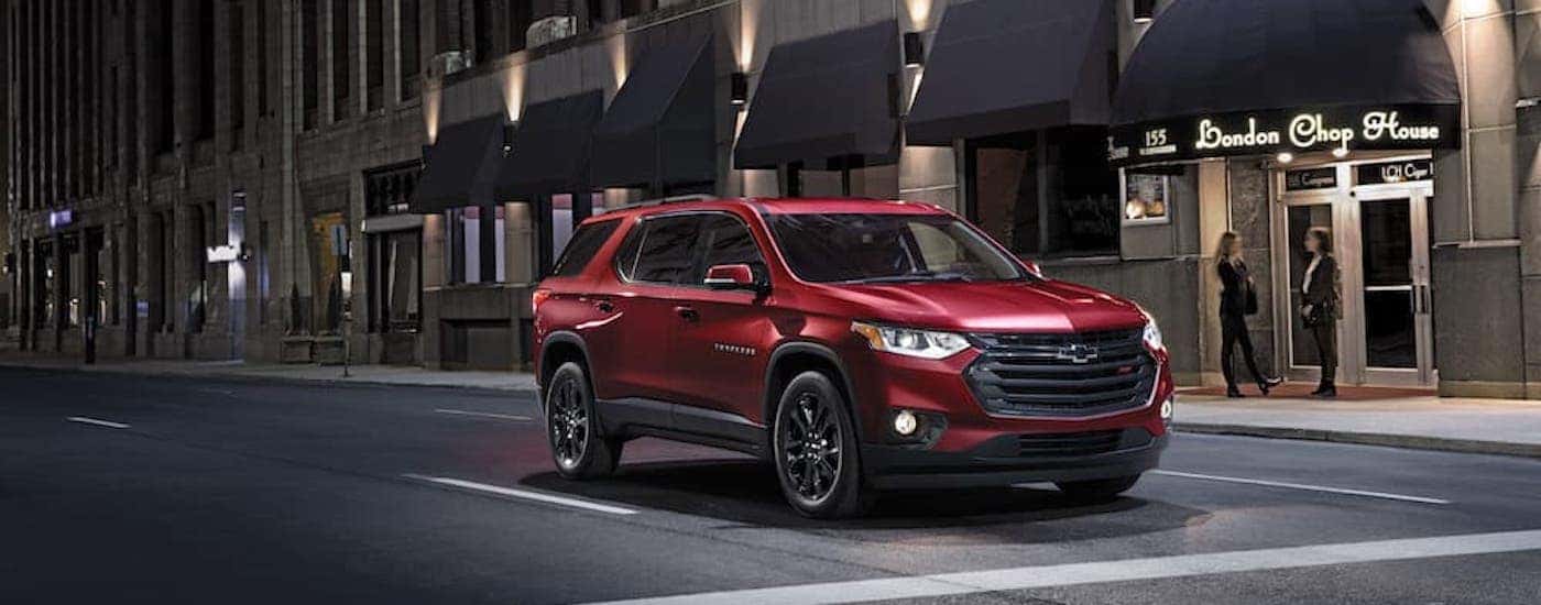 A red 2021 Chevy Traverse from the front at an angle.