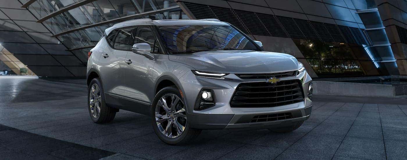 Grey used 2022 Chevy Blazer for sale near Concord parked outside a building.