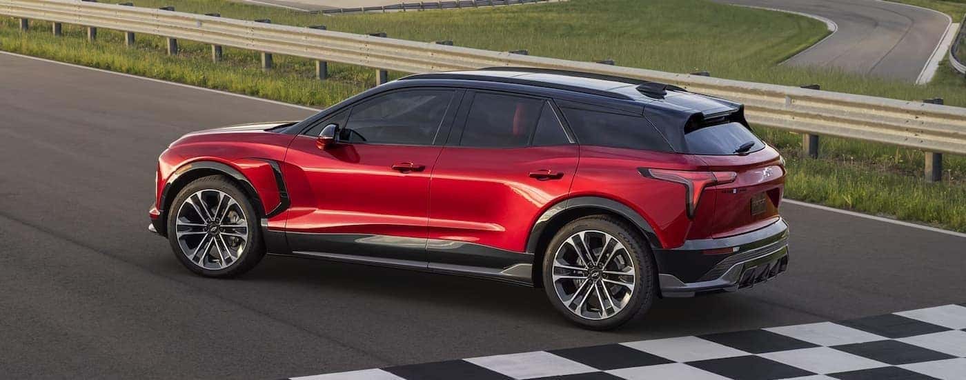 A red 2024 Chevy Blazer EV parked on a finish line.