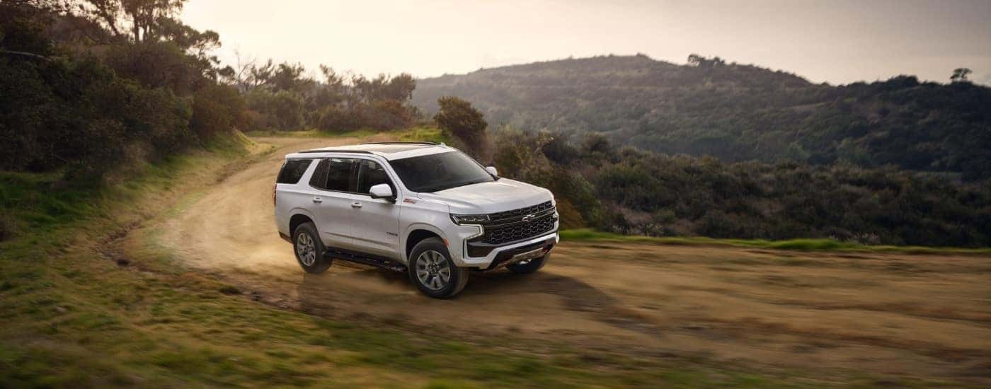 A white 2021 Chevy Tahoe after leaving a dealer with used cars for sale near University City.