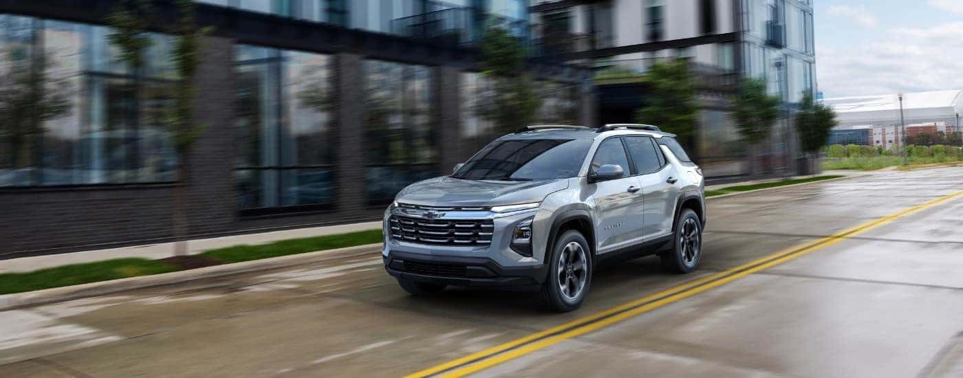 A grey 2025 Chevy Equinox from the front at an angle.