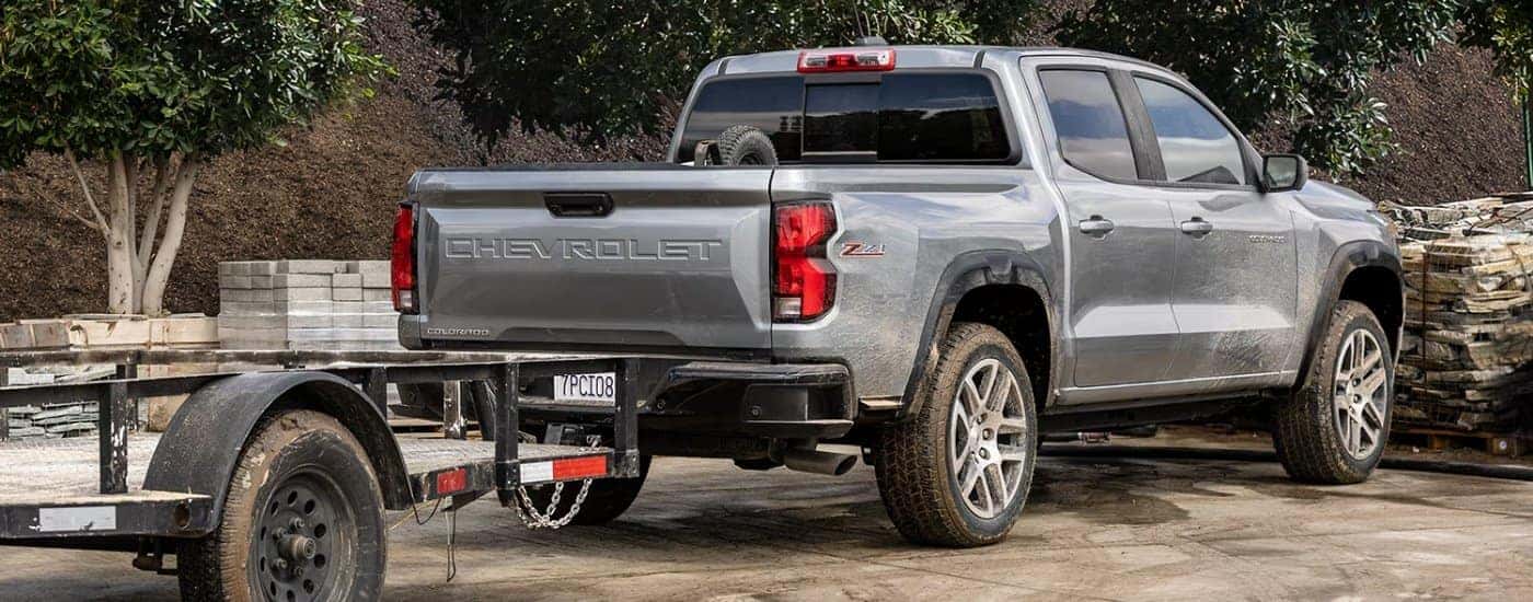 Grey 2024 Chevy Colorado Z71 towing a trailer
