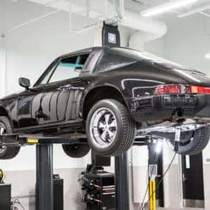 Older Porsche Model on Lift