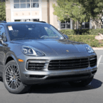 Patrick Posey of Porsche Ontario standing next to the 2021 Porsche Cayenne S.