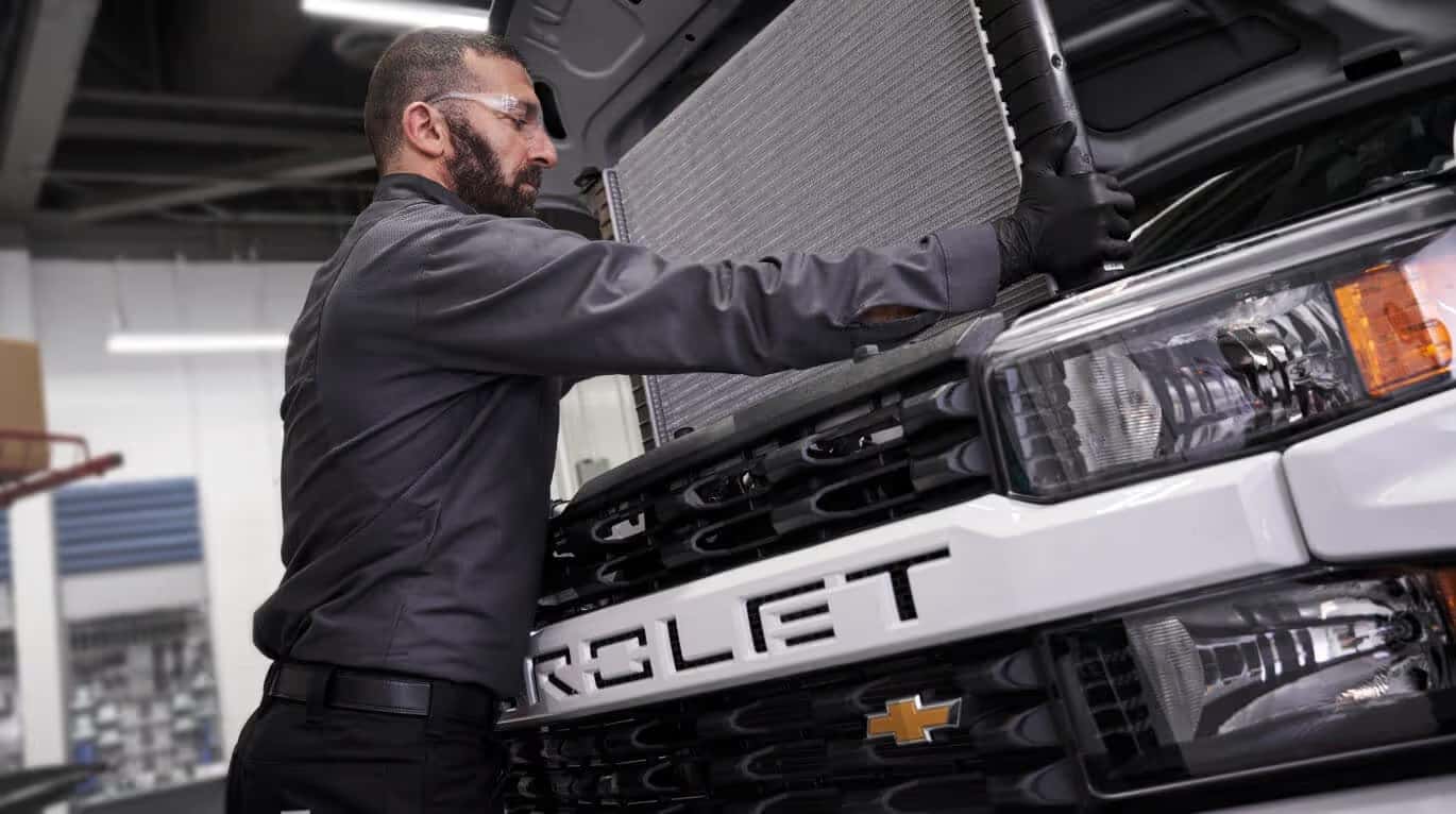 Chevrolet Silverado 1500 in a dealership service bay