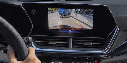 The 2025 Chevy Trax Safety Assist screen monitor, showing the driver the rear view while parking.