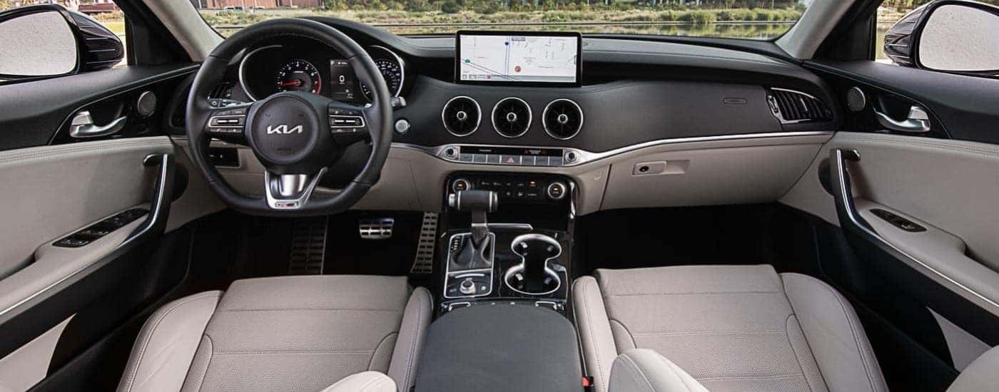 The black and grey interior is shown in a 2021 Kia Stinger GT-Line.
