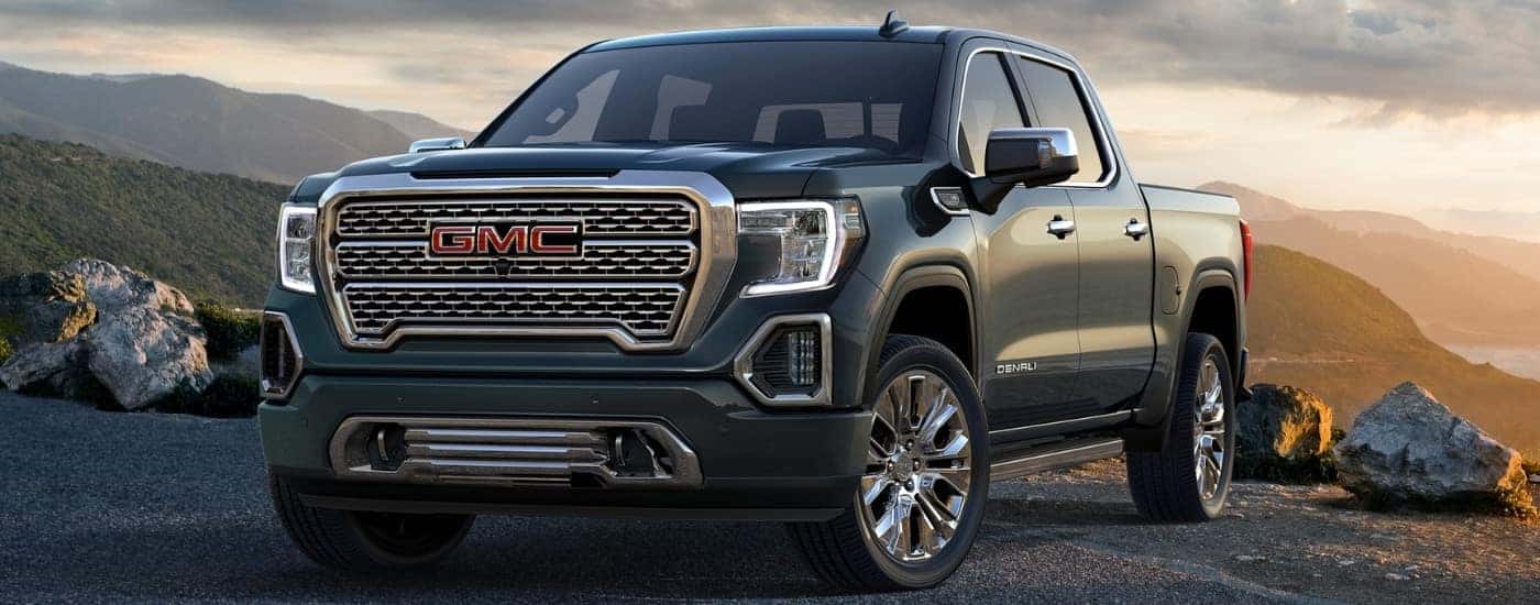 Grey 2019 Sierra 1500 Denali parked at an overlook