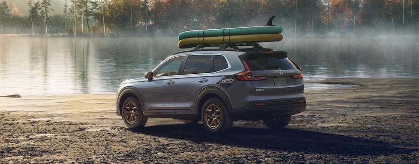 A grey 2023 Honda CR-V is shown from the side after leaving a dealer that has used cars for sale near Mascot.