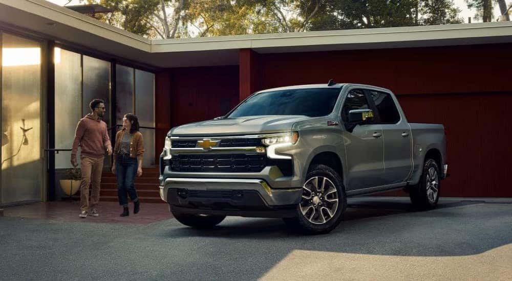 A silver 2023 Chevy Silverado 1500 Z71 parked on a driveway.