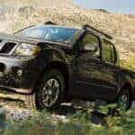 A black 2019 Nissan Frontier PRO 4X off-roading