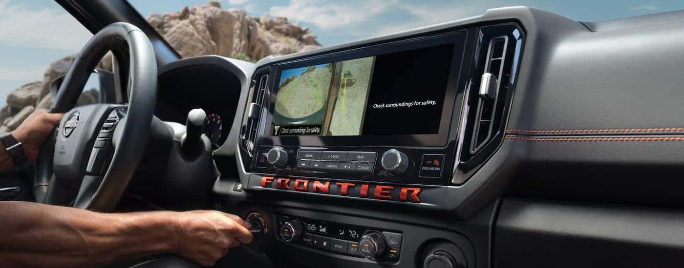 Back-up camera displayed on the infotainment screen in a 2025 Nissan Frontier for sale