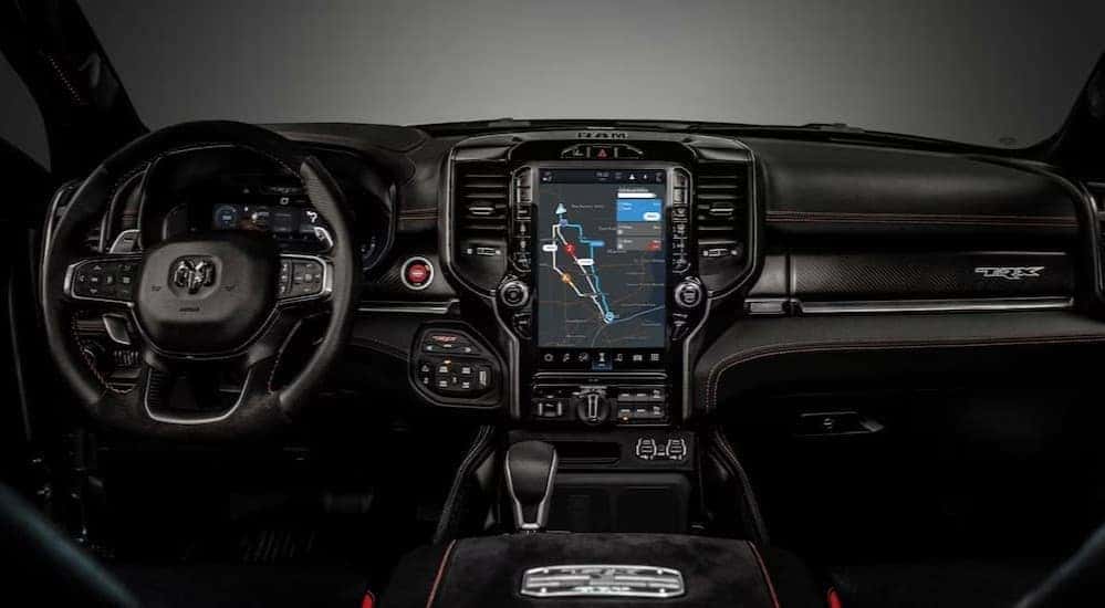 The black dash in a sed 2023 Ram 15oo for sale.