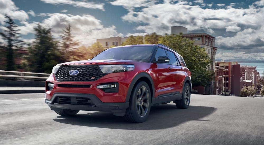 Red 2021 Ford Explorer ST for sale parked on the street.