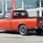 Red 1976 Datsun 620 from the rear