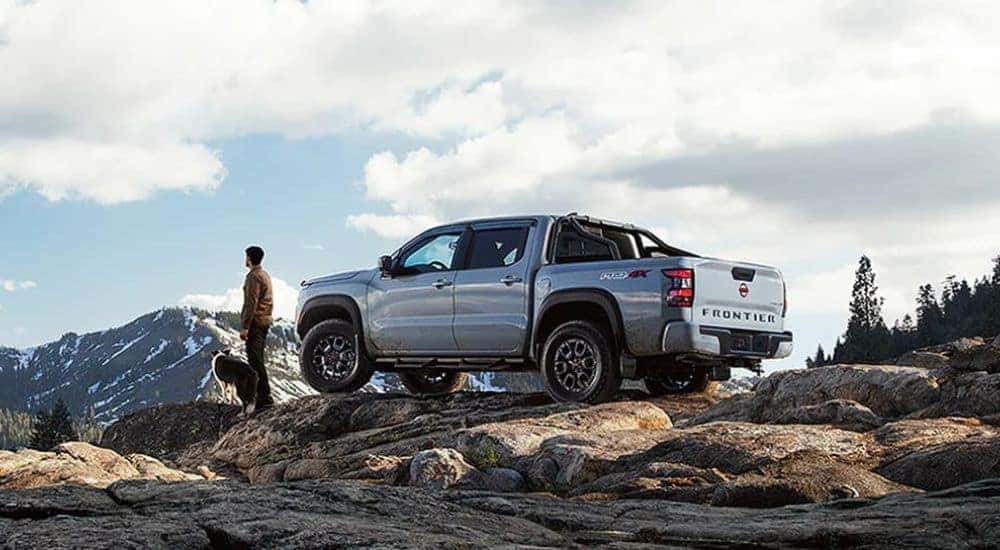 A recently purchased silver 2024 Nissan Frontier that was for sale in Knoxville parked off road