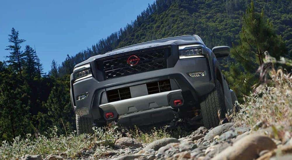 Grey 2024 Nissan Frontier PRO driving off road