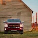 A used red 2016 Chevy Silverado 1500 for sale parked outdoors.