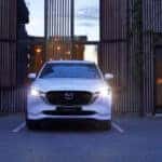 White 2022 Mazda CX-5 backed into a parking spot