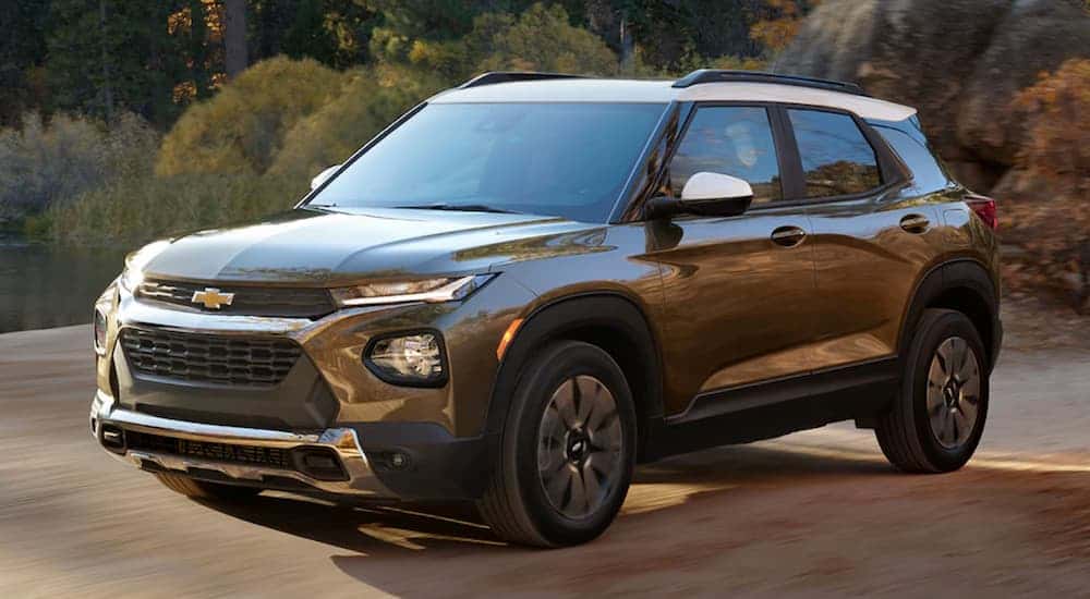 Brown 2021 Chevy Trailblazer driving to see used SUVs for sale in Knoxville