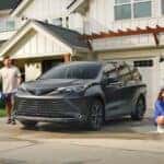 A gray 2025 Toyota Sienna parked on a driveway.