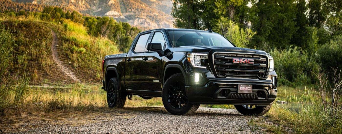 Dark 2020 GMC Sierra 1500 SLE Elevation off-road driving.
