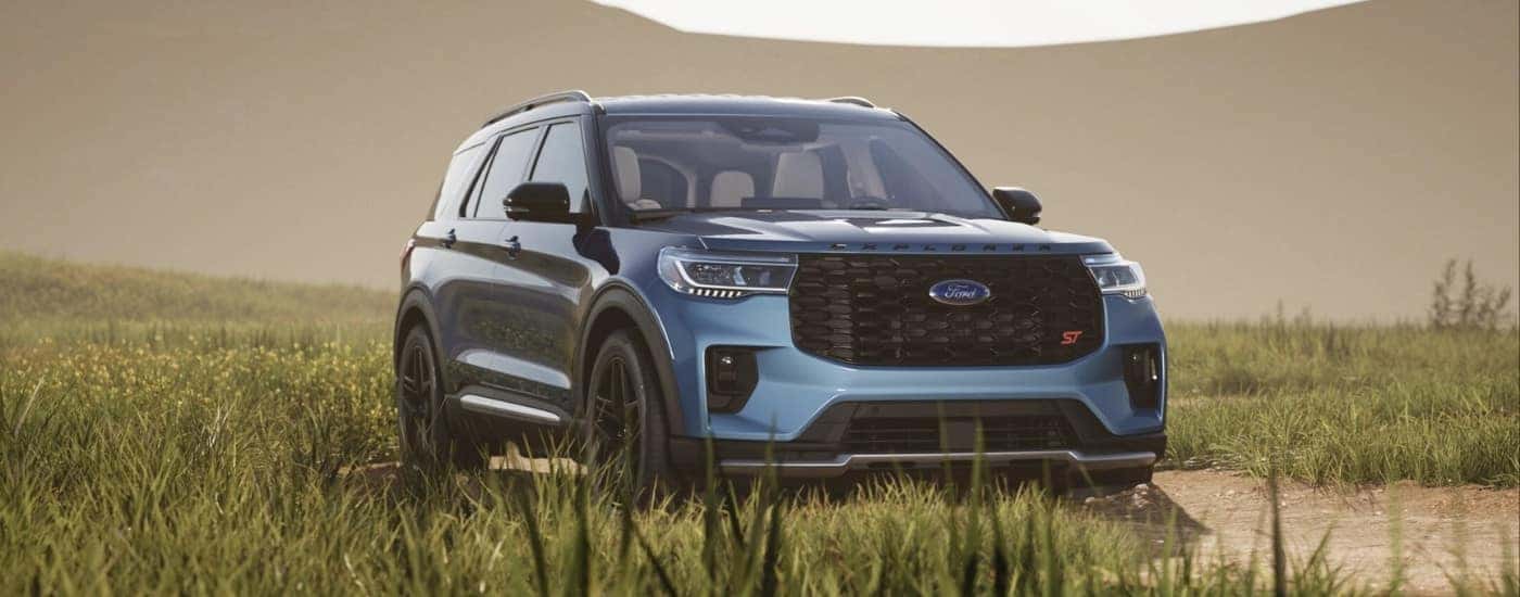Blue 2026 Ford Explorer ST parked off-road