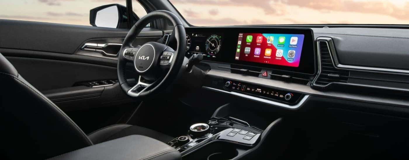 Infotainment system and black dash in a 2023 Kia Sportage