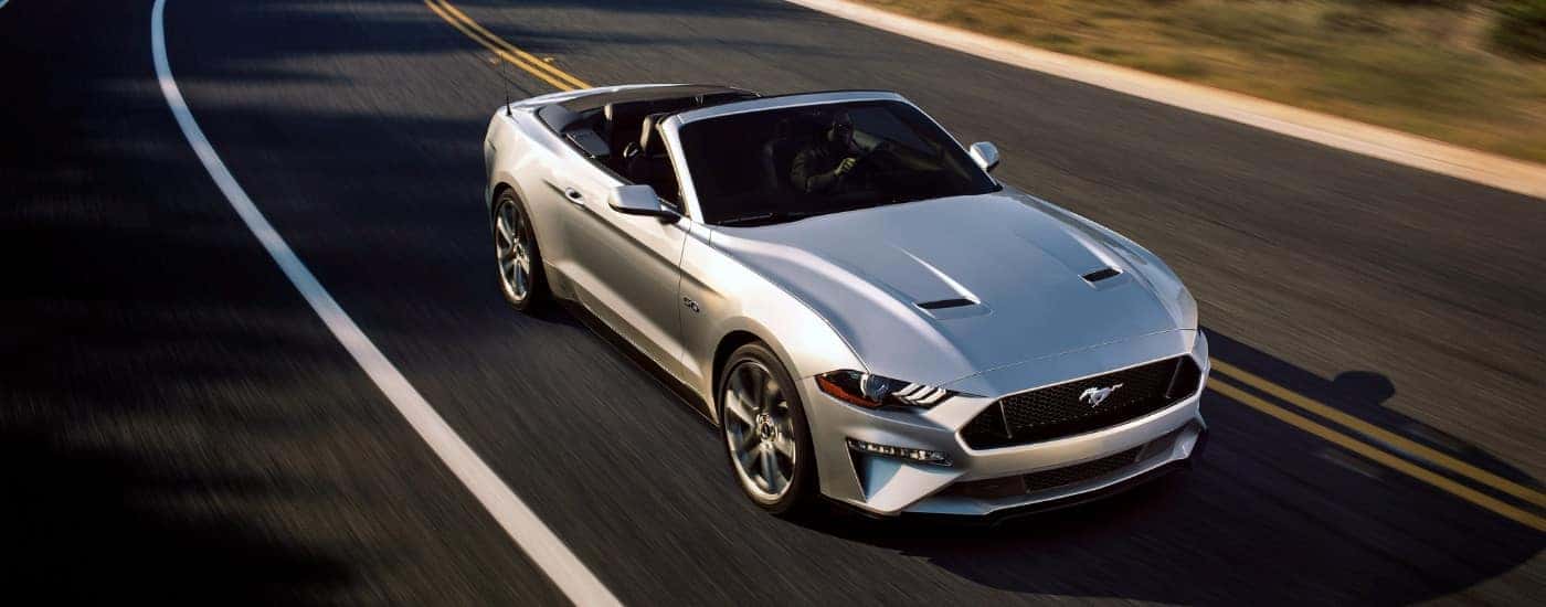 Silver 2019 Ford Mustang GT driving on a highway