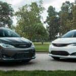 gray chrysler pacifica and white pacifica
