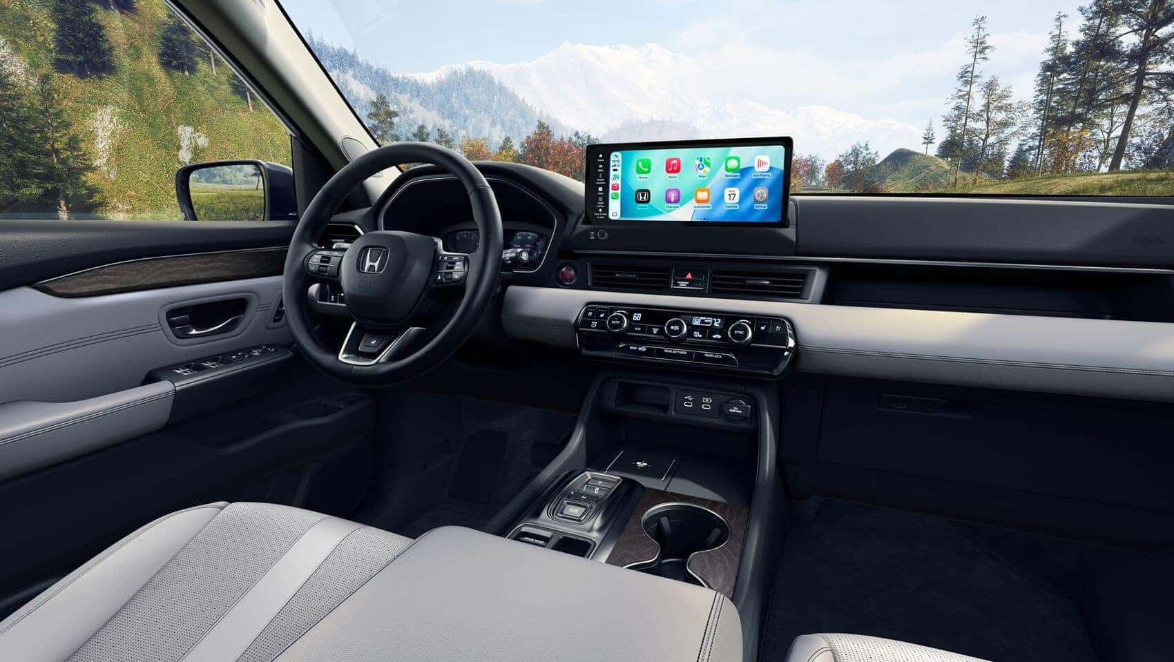 Honda Pilot interior of steering wheel and technology touchscreen