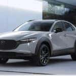 White 2026 MAZDA CX-30 Parked In Front of Building