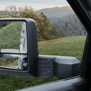 Side mirror view of GMC Sierra 2500HD Truck