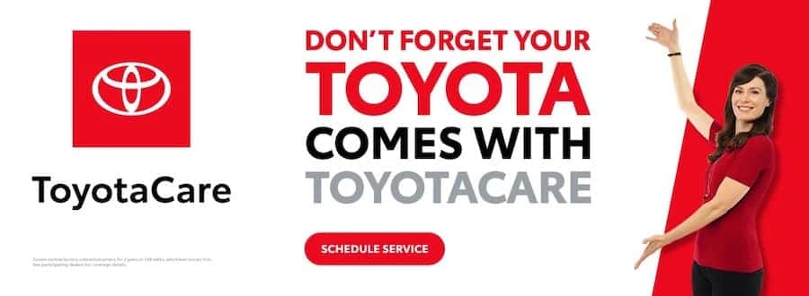 Woman showing Toyotacare sign