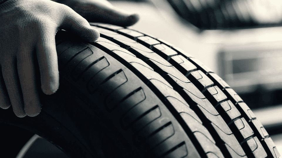 A tire rotation being performed.